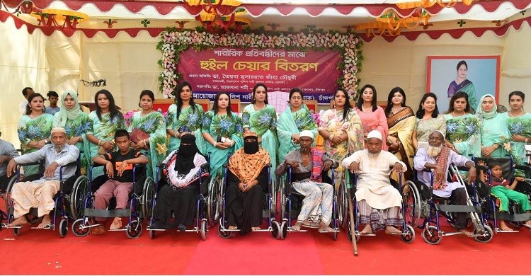 পুনাক চাঁদপুরের উদ্যোগে শারীরিক প্রতিবন্ধীদের মাঝে হুইল চেয়ার বিতরণ