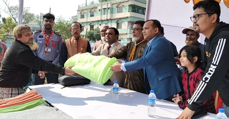 নেত্রকোণায় ক্লাব নটরডেমিয়ান্স বাংলাদেশ লিমিটেডের শীতবস্ত্র বিতরণ